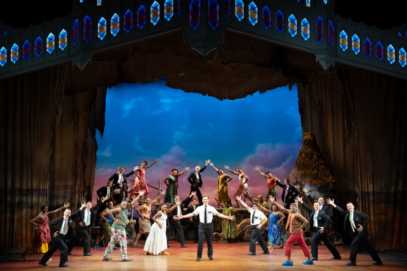 Sam McLellan and company in THE BOOK OF MORMON North American tour Photo by Julieta Cervantes