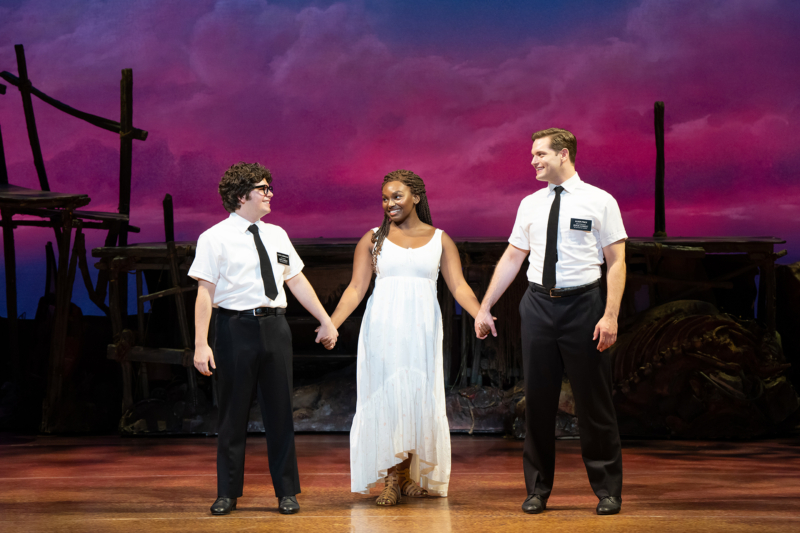 (L-R) Sam McLellan, Keke Nesbitt, Diego Enrico, and company in THE BOOK OF MORMON North American tour Photo by Julieta Cervantes